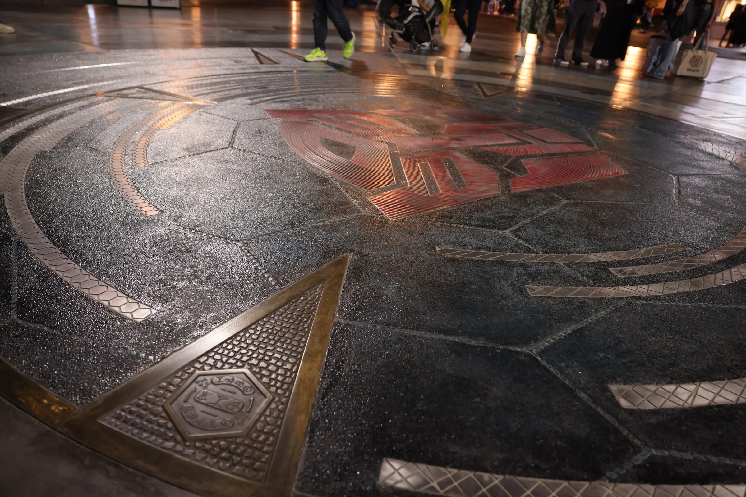 Themed paving detail in the Transformers zone