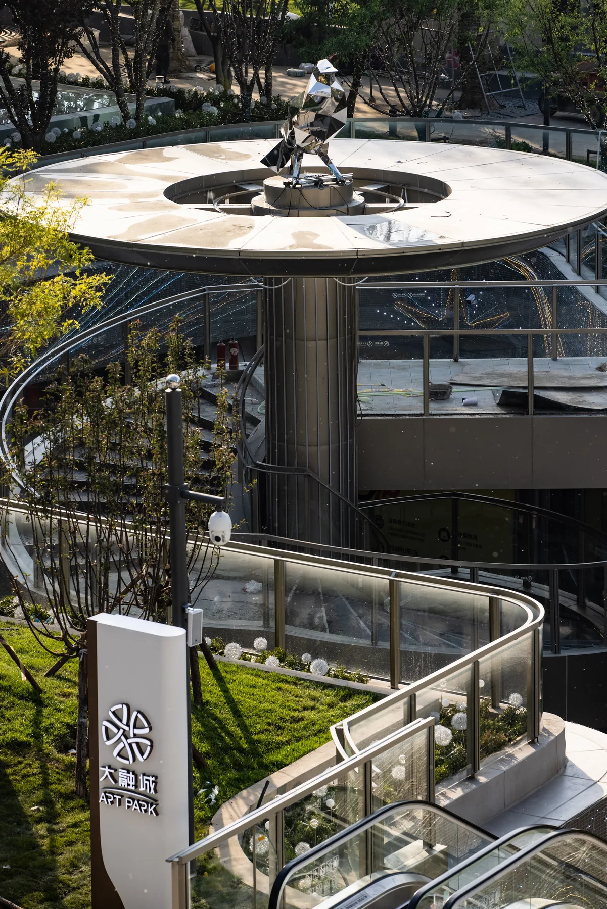 Sunken plaza and preserved tree at Beijing Zhongguancun West