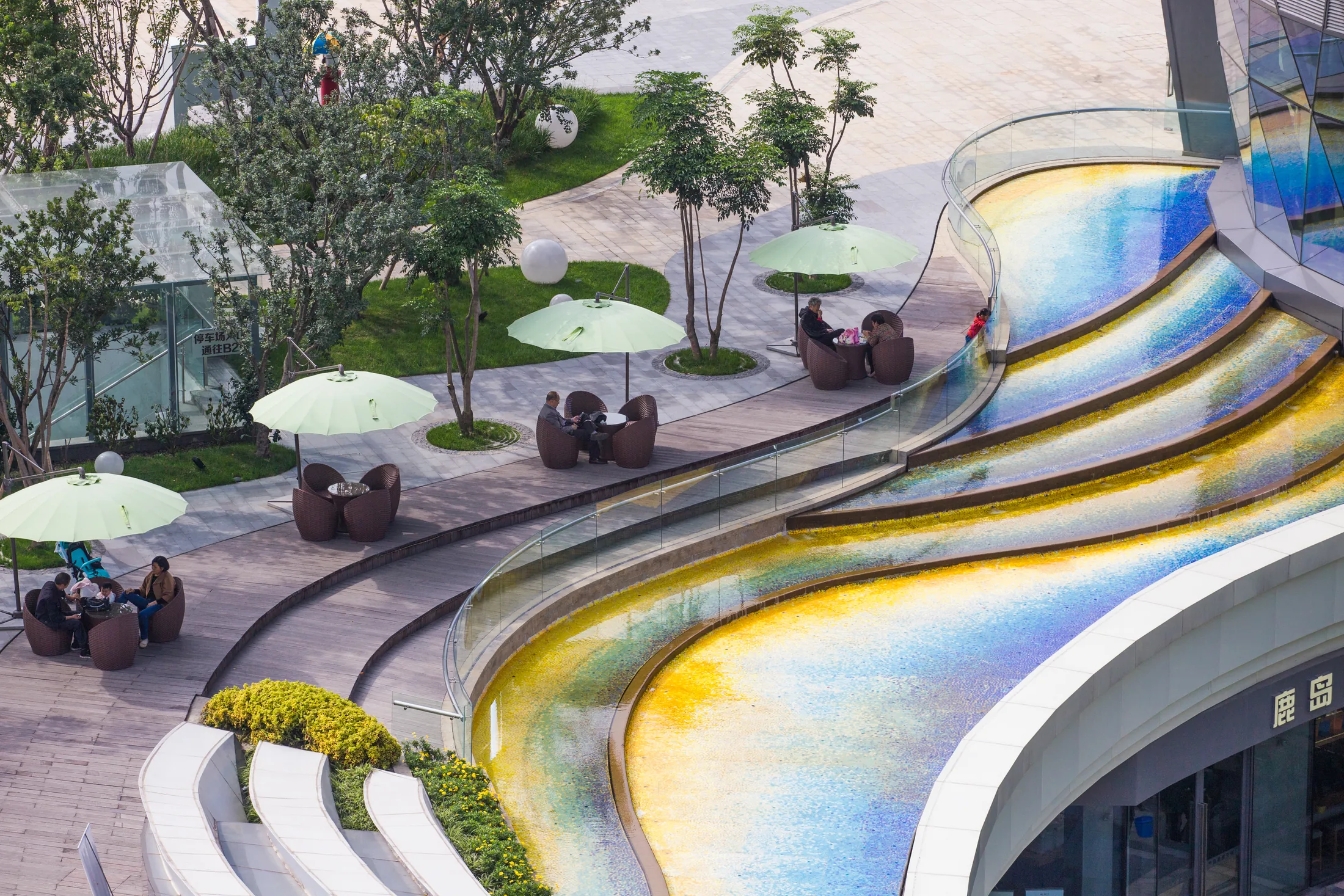 Cafe terraces by the water landscape at Chengdu Joy City