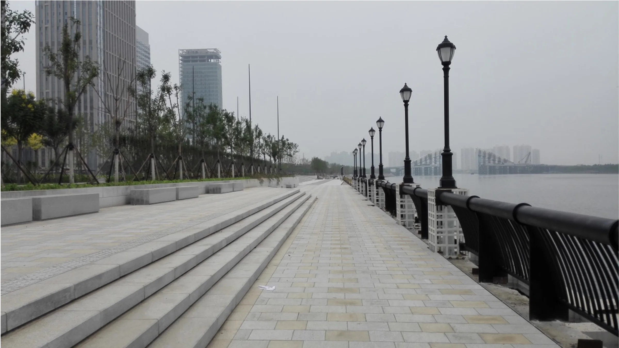 Stepped riverwalk at Tianjin Yujiapu Riverfront Park