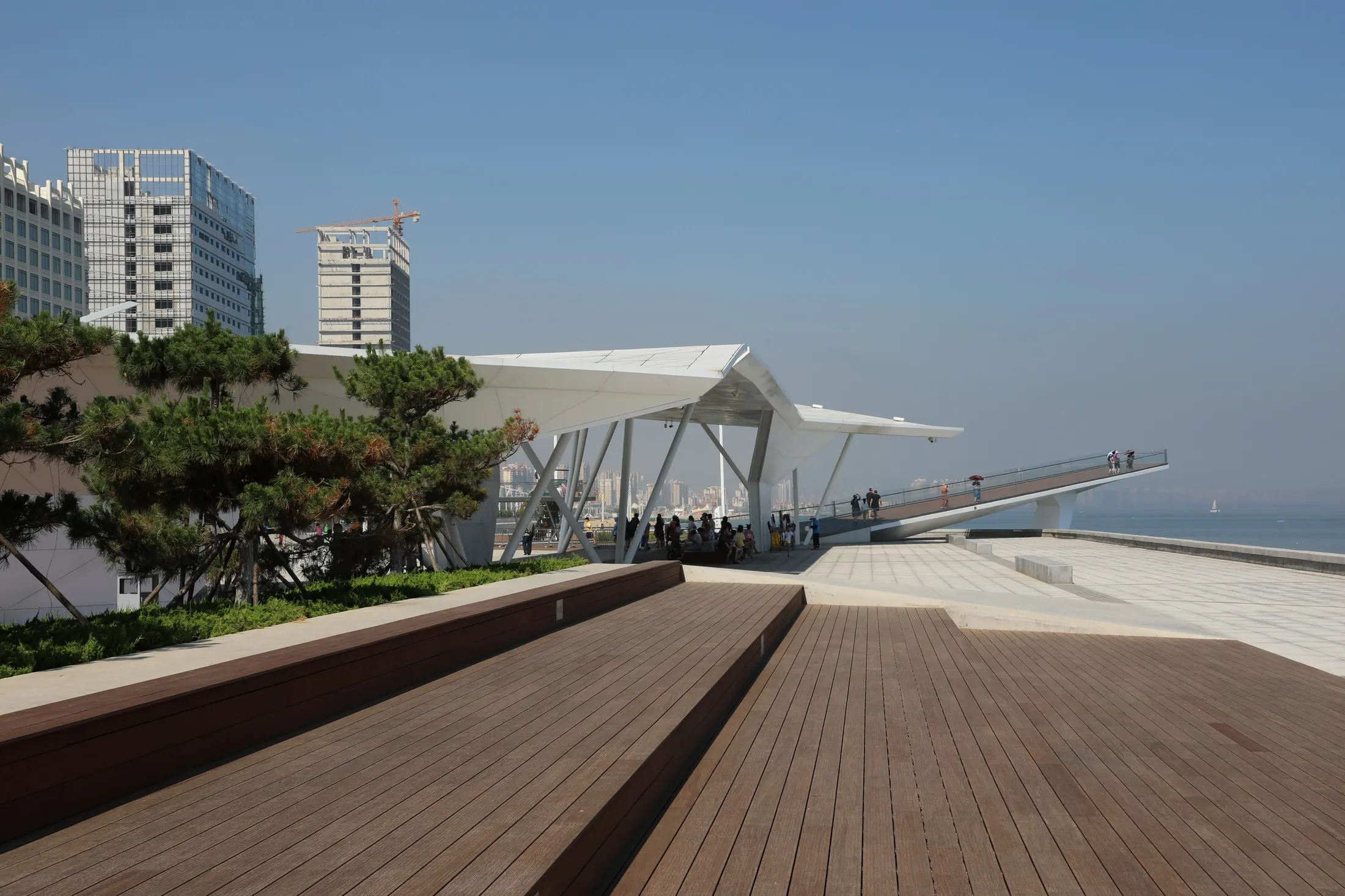 Oceanfront plaza and shaded canopy at Housha Plaza