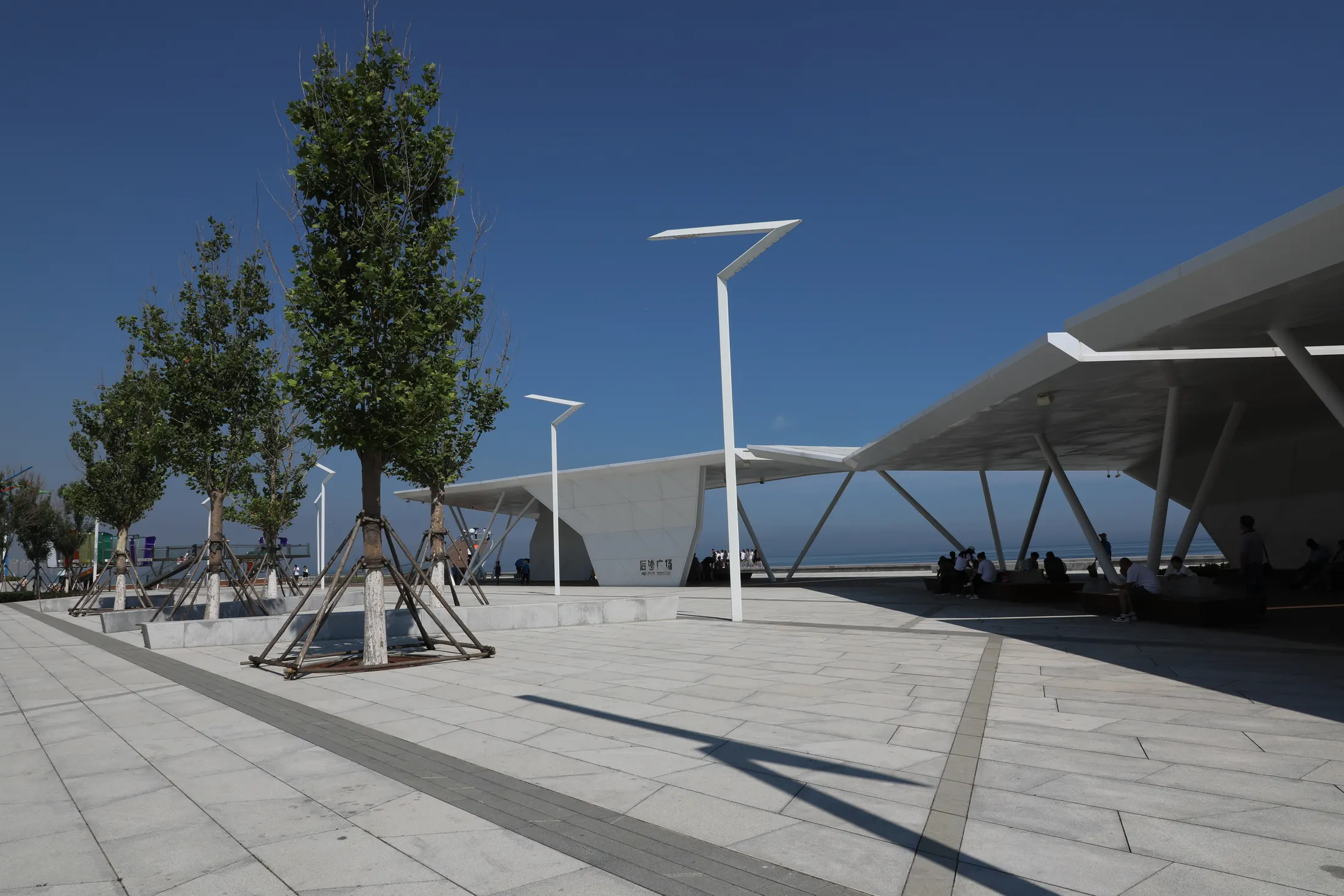Shaded plaza at Yantai Golden Beach Housha Plaza